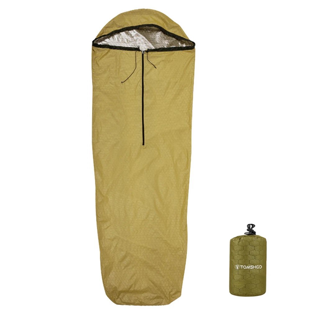 Couverture de survie, bivy d'urgence, sac de couchage imperméable pour la randonnée et le bivouac 180g "Tomshoo - Survival bag" - Planète Rando