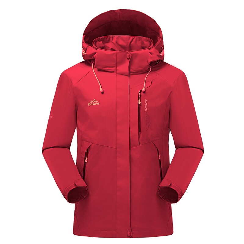 Une veste LNGXO rouge pour femme parfaite pour les aventures en plein air, avec une capuche.