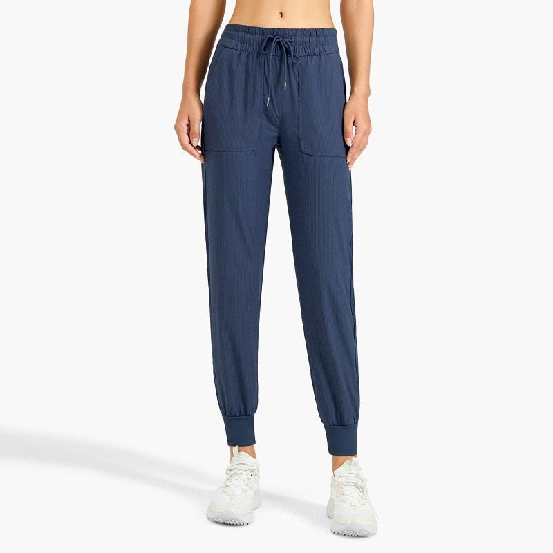 Pantalon de sport décontracté avec cordon de serrage et poches "Dahnvi - Leggings series" - Bleu navy / S | Planète Rando