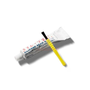 Tube de "Sil-Tec - Seam sealer", un Scellant / colle extérieur pour tente en Nylon et Silicone Double face, avec un pinceau applicateur jaune placé à côté, idéal pour appliquer un scellant imperméable sur les tentes enduites de silicone.